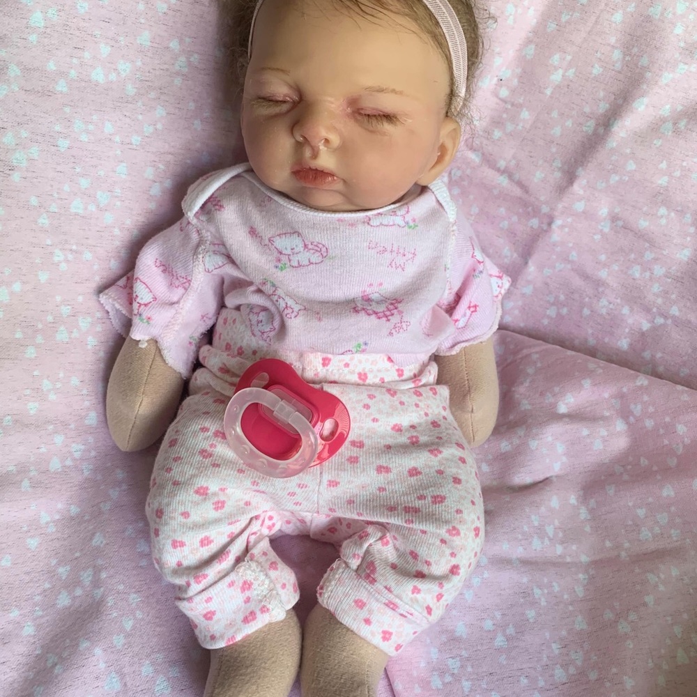 Cuddle body reborn baby doll